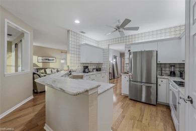 Welcome to Charleston Square -- a hidden gem tucked inside the on Imperial Golf Club in Florida - for sale on GolfHomes.com, golf home, golf lot