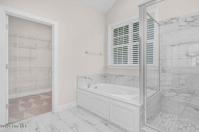 Step into easy one-level living in this 2023 carriage-style home on The Golf Club At Rocky Mount in North Carolina - for sale on GolfHomes.com, golf home, golf lot