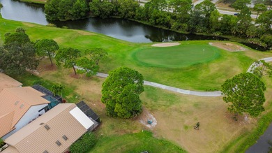 Embrace the ultimate Florida lifestyle in this 3/2/2 home on St. Lucie Trail Golf Club in Florida - for sale on GolfHomes.com, golf home, golf lot