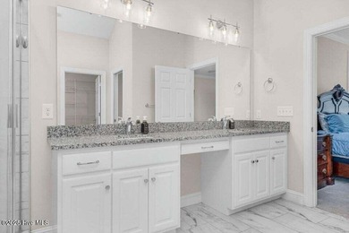 Step into easy one-level living in this 2023 carriage-style home on The Golf Club At Rocky Mount in North Carolina - for sale on GolfHomes.com, golf home, golf lot