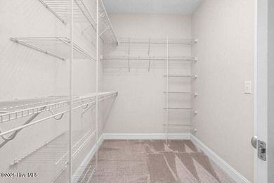 Step into easy one-level living in this 2023 carriage-style home on The Golf Club At Rocky Mount in North Carolina - for sale on GolfHomes.com, golf home, golf lot