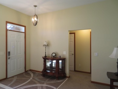 You'll appreciate the fine care this home on the golf course has on Black Squirrel Golf Club in Indiana - for sale on GolfHomes.com, golf home, golf lot