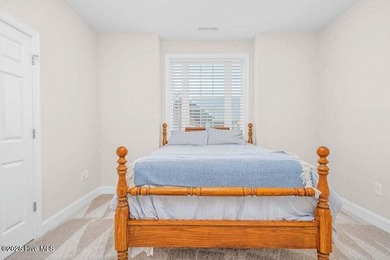 Step into easy one-level living in this 2023 carriage-style home on The Golf Club At Rocky Mount in North Carolina - for sale on GolfHomes.com, golf home, golf lot