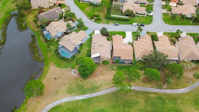 Embrace the ultimate Florida lifestyle in this 3/2/2 home on St. Lucie Trail Golf Club in Florida - for sale on GolfHomes.com, golf home, golf lot
