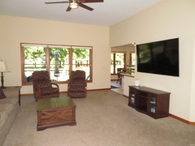 You'll appreciate the fine care this home on the golf course has on Black Squirrel Golf Club in Indiana - for sale on GolfHomes.com, golf home, golf lot