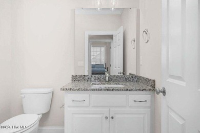 Step into easy one-level living in this 2023 carriage-style home on The Golf Club At Rocky Mount in North Carolina - for sale on GolfHomes.com, golf home, golf lot