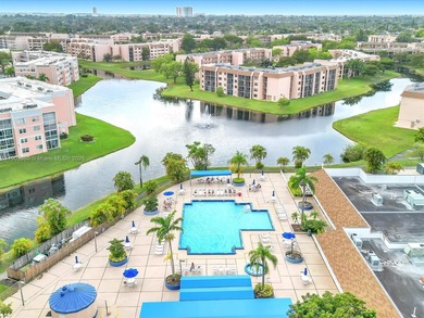 Newly reduced price! Welcome to this quiet, end unit on the 4th on Sunrise Lakes Phase IV Golf Course in Florida - for sale on GolfHomes.com, golf home, golf lot