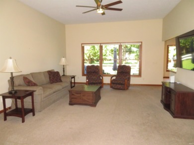 You'll appreciate the fine care this home on the golf course has on Black Squirrel Golf Club in Indiana - for sale on GolfHomes.com, golf home, golf lot