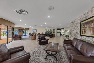 Newly reduced price! Welcome to this quiet, end unit on the 4th on Sunrise Lakes Phase IV Golf Course in Florida - for sale on GolfHomes.com, golf home, golf lot