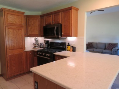 You'll appreciate the fine care this home on the golf course has on Black Squirrel Golf Club in Indiana - for sale on GolfHomes.com, golf home, golf lot