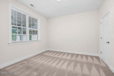 Step into easy one-level living in this 2023 carriage-style home on The Golf Club At Rocky Mount in North Carolina - for sale on GolfHomes.com, golf home, golf lot