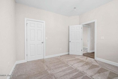 Step into easy one-level living in this 2023 carriage-style home on The Golf Club At Rocky Mount in North Carolina - for sale on GolfHomes.com, golf home, golf lot