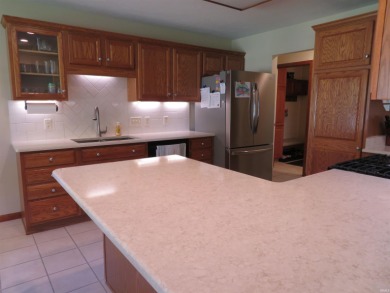 You'll appreciate the fine care this home on the golf course has on Black Squirrel Golf Club in Indiana - for sale on GolfHomes.com, golf home, golf lot