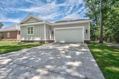 Step into easy one-level living in this 2023 carriage-style home on The Golf Club At Rocky Mount in North Carolina - for sale on GolfHomes.com, golf home, golf lot