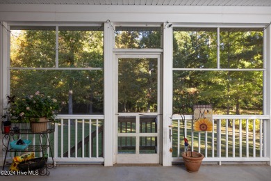 This stunning custom-built 4-bedroom, 3.5-bath home is set on a on Sound Golf Links at Albemarle Plantation in North Carolina - for sale on GolfHomes.com, golf home, golf lot