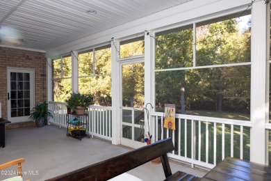 This stunning custom-built 4-bedroom, 3.5-bath home is set on a on Sound Golf Links at Albemarle Plantation in North Carolina - for sale on GolfHomes.com, golf home, golf lot