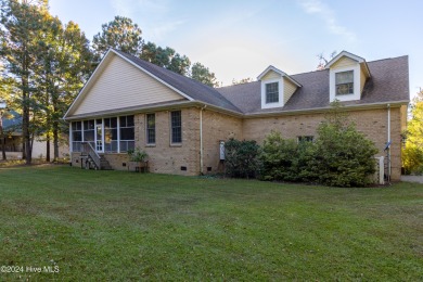 This stunning custom-built 4-bedroom, 3.5-bath home is set on a on Sound Golf Links at Albemarle Plantation in North Carolina - for sale on GolfHomes.com, golf home, golf lot