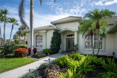 Curb appeal w/custom Landscaping, Dynamic Interior & private on Pelican Pointe Golf and Country Club in Florida - for sale on GolfHomes.com, golf home, golf lot