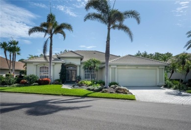 Curb appeal w/custom Landscaping, Dynamic Interior & private on Pelican Pointe Golf and Country Club in Florida - for sale on GolfHomes.com, golf home, golf lot