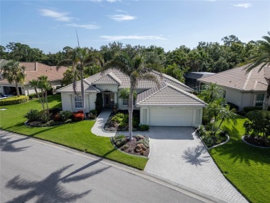 Curb appeal w/custom Landscaping, Dynamic Interior & private on Pelican Pointe Golf and Country Club in Florida - for sale on GolfHomes.com, golf home, golf lot