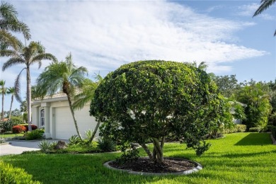 Curb appeal w/custom Landscaping, Dynamic Interior & private on Pelican Pointe Golf and Country Club in Florida - for sale on GolfHomes.com, golf home, golf lot