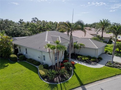 Curb appeal w/custom Landscaping, Dynamic Interior & private on Pelican Pointe Golf and Country Club in Florida - for sale on GolfHomes.com, golf home, golf lot