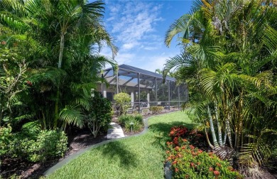 Curb appeal w/custom Landscaping, Dynamic Interior & private on Pelican Pointe Golf and Country Club in Florida - for sale on GolfHomes.com, golf home, golf lot