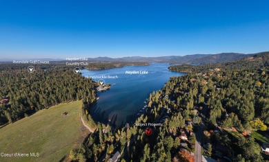 Nestled just above Hayden Lake, this exclusive building lot is on Hayden Lake Country Club in Idaho - for sale on GolfHomes.com, golf home, golf lot