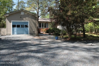 This Golf Front home is in the loveliest part of town.  It's on Whispering Pines Golf Course in North Carolina - for sale on GolfHomes.com, golf home, golf lot