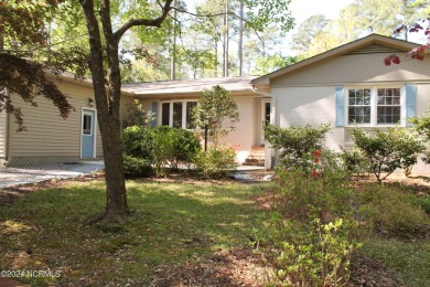 This Golf Front home is in the loveliest part of town.  It's on Whispering Pines Golf Course in North Carolina - for sale on GolfHomes.com, golf home, golf lot