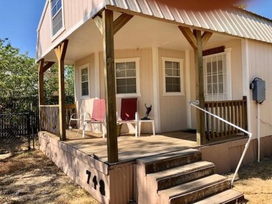 This CABIN in located on a nice lot that adjoins the Albany Golf on Albany Golf Club in Texas - for sale on GolfHomes.com, golf home, golf lot