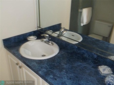 LOVELY 2 BEDROOM 2 BATH CONDO IN FABULOUS SUNRISE LAKES PHASE 3 on Sunrise Lakes Phase III in Florida - for sale on GolfHomes.com, golf home, golf lot