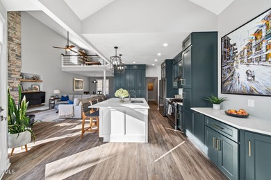 Wake up to breathtaking panoramic lake views from this on River Golf and Country Club at Lake Royale in North Carolina - for sale on GolfHomes.com, golf home, golf lot