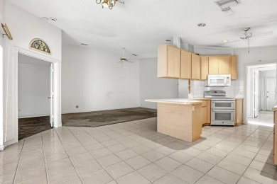 This 2-bedroom, 2-bathroom home with a split floor plan offers on The Golf Club of Jupiter in Florida - for sale on GolfHomes.com, golf home, golf lot