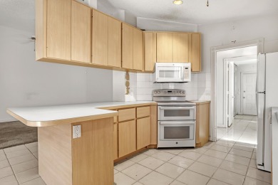 This 2-bedroom, 2-bathroom home with a split floor plan offers on The Golf Club of Jupiter in Florida - for sale on GolfHomes.com, golf home, golf lot