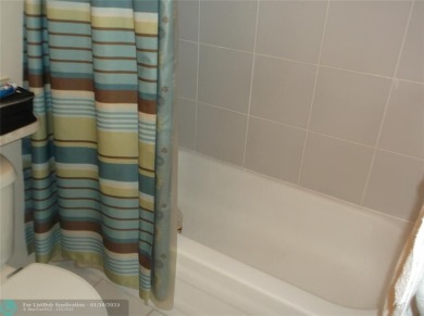 LOVELY 2 BEDROOM 2 BATH CONDO IN FABULOUS SUNRISE LAKES PHASE 3 on Sunrise Lakes Phase III in Florida - for sale on GolfHomes.com, golf home, golf lot