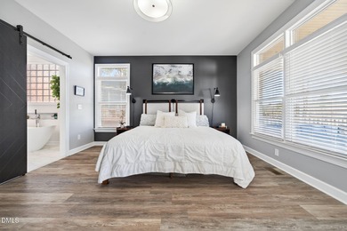 Wake up to breathtaking panoramic lake views from this on River Golf and Country Club at Lake Royale in North Carolina - for sale on GolfHomes.com, golf home, golf lot