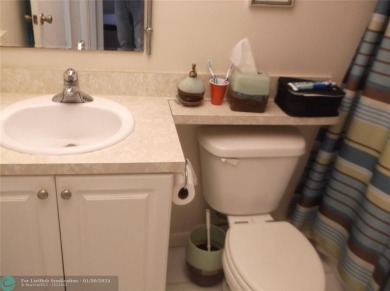 LOVELY 2 BEDROOM 2 BATH CONDO IN FABULOUS SUNRISE LAKES PHASE 3 on Sunrise Lakes Phase III in Florida - for sale on GolfHomes.com, golf home, golf lot