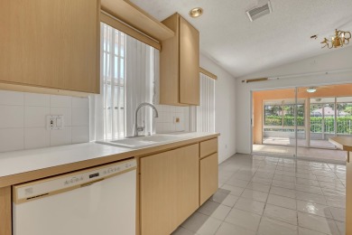 This 2-bedroom, 2-bathroom home with a split floor plan offers on The Golf Club of Jupiter in Florida - for sale on GolfHomes.com, golf home, golf lot