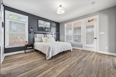 Wake up to breathtaking panoramic lake views from this on River Golf and Country Club at Lake Royale in North Carolina - for sale on GolfHomes.com, golf home, golf lot