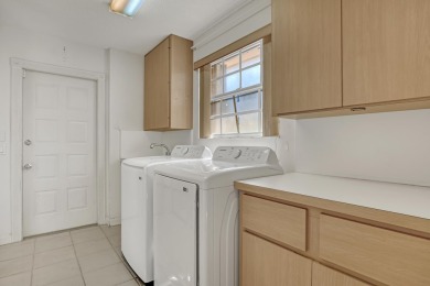 This 2-bedroom, 2-bathroom home with a split floor plan offers on The Golf Club of Jupiter in Florida - for sale on GolfHomes.com, golf home, golf lot