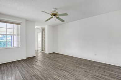 This 2-bedroom, 2-bathroom home with a split floor plan offers on The Golf Club of Jupiter in Florida - for sale on GolfHomes.com, golf home, golf lot