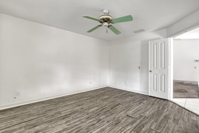 This 2-bedroom, 2-bathroom home with a split floor plan offers on The Golf Club of Jupiter in Florida - for sale on GolfHomes.com, golf home, golf lot