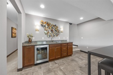 Enjoy the blend of nature and city life in this immaculate 4 on Ellis Park Golf Course in Iowa - for sale on GolfHomes.com, golf home, golf lot
