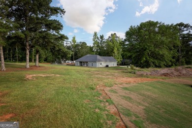 Welcome to this stunning 3-bedroom, 2-bath home perfectly on Cabin Creek Golf Club in Georgia - for sale on GolfHomes.com, golf home, golf lot