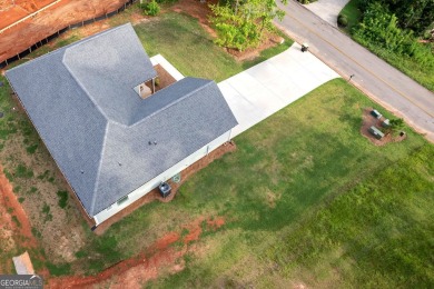 Welcome to this stunning 3-bedroom, 2-bath home perfectly on Cabin Creek Golf Club in Georgia - for sale on GolfHomes.com, golf home, golf lot