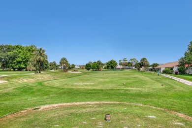 This 2-bedroom, 2-bathroom home with a split floor plan offers on The Golf Club of Jupiter in Florida - for sale on GolfHomes.com, golf home, golf lot