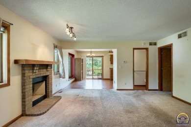 Don't miss this well-maintained and move-in-ready half-duplex on Lake Shawnee Golf Course in Kansas - for sale on GolfHomes.com, golf home, golf lot