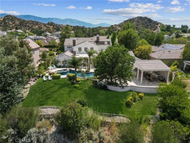 Welcome to this magnificent 5-bedroom, 5-bathroom pool home on Robinson Ranch - Mountain Course in California - for sale on GolfHomes.com, golf home, golf lot