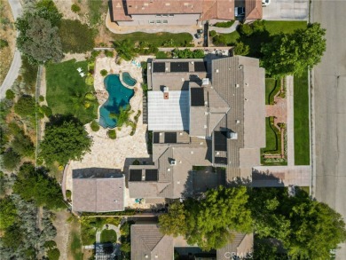 Welcome to this magnificent 5-bedroom, 5-bathroom pool home on Robinson Ranch - Mountain Course in California - for sale on GolfHomes.com, golf home, golf lot